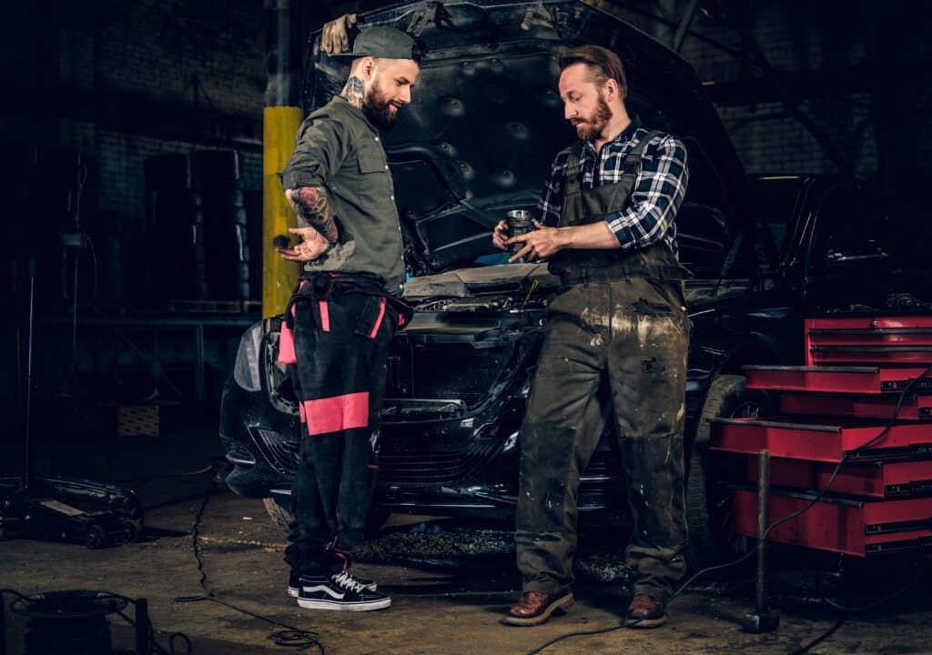 Two Bearded Mechanics Inspecting Car S Engine Par 2023 11 27 05 30 42 Utc No.1 Best Auto Repair Shops In Irving Tx- Express Auto Irving